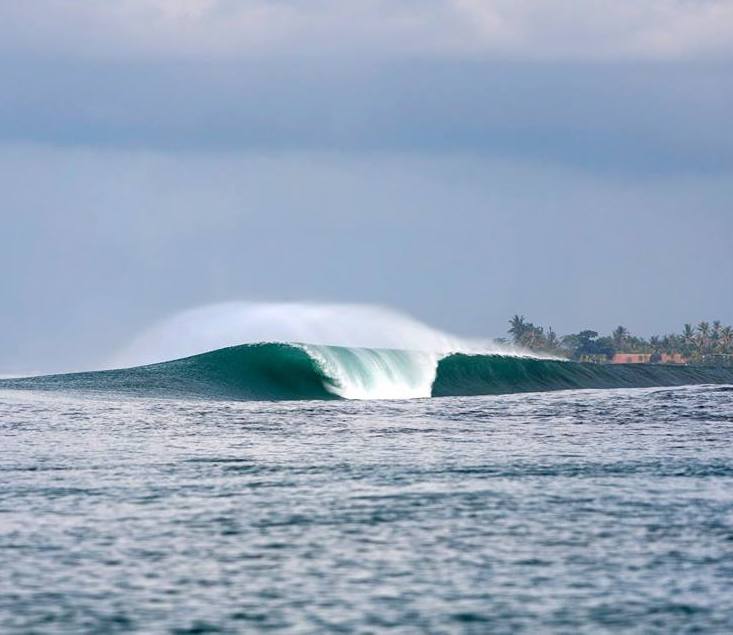 Huge wave crashing at Keramas Beach in Bali, Indonesia