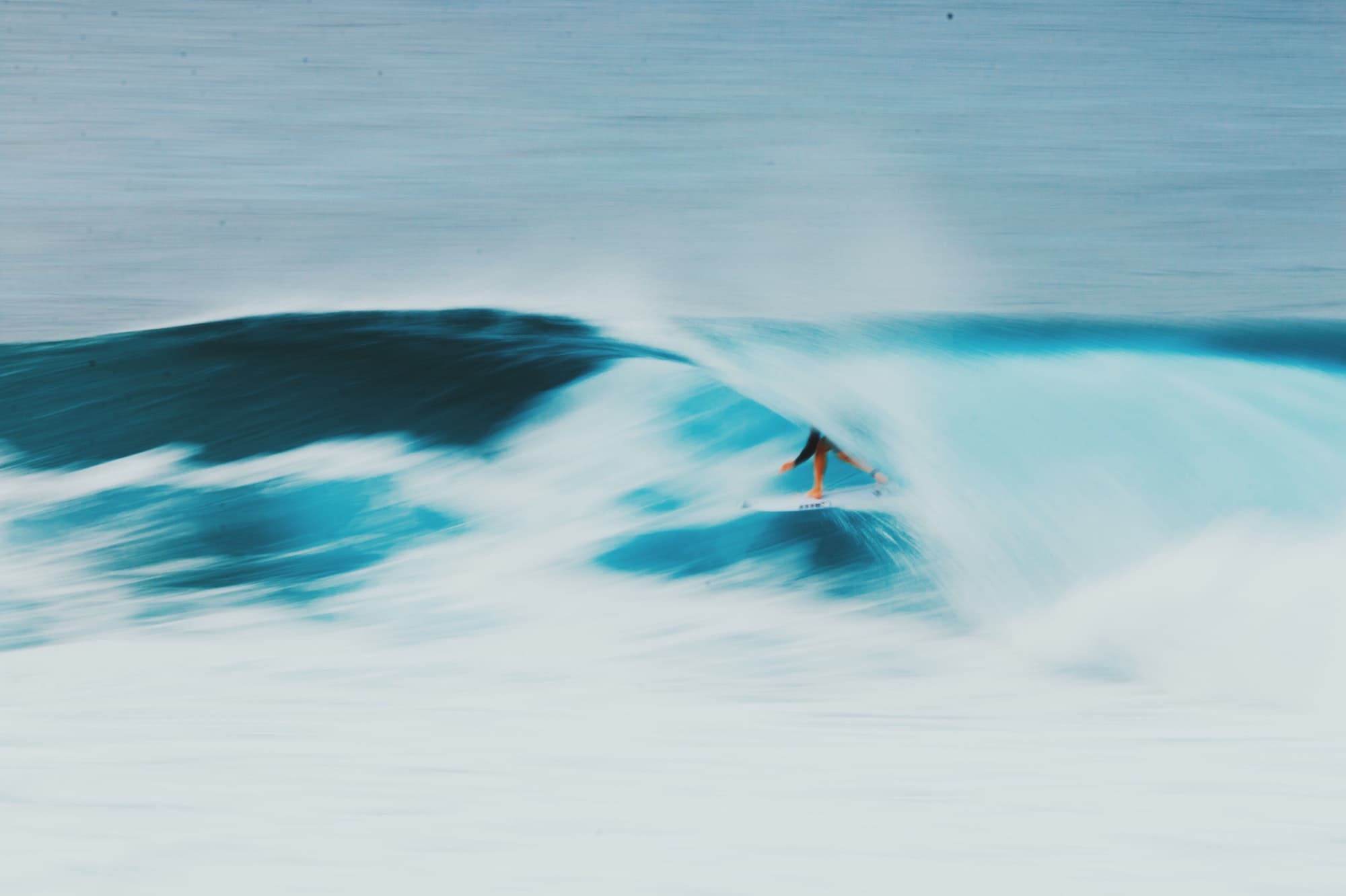 man surfing wave in Asia