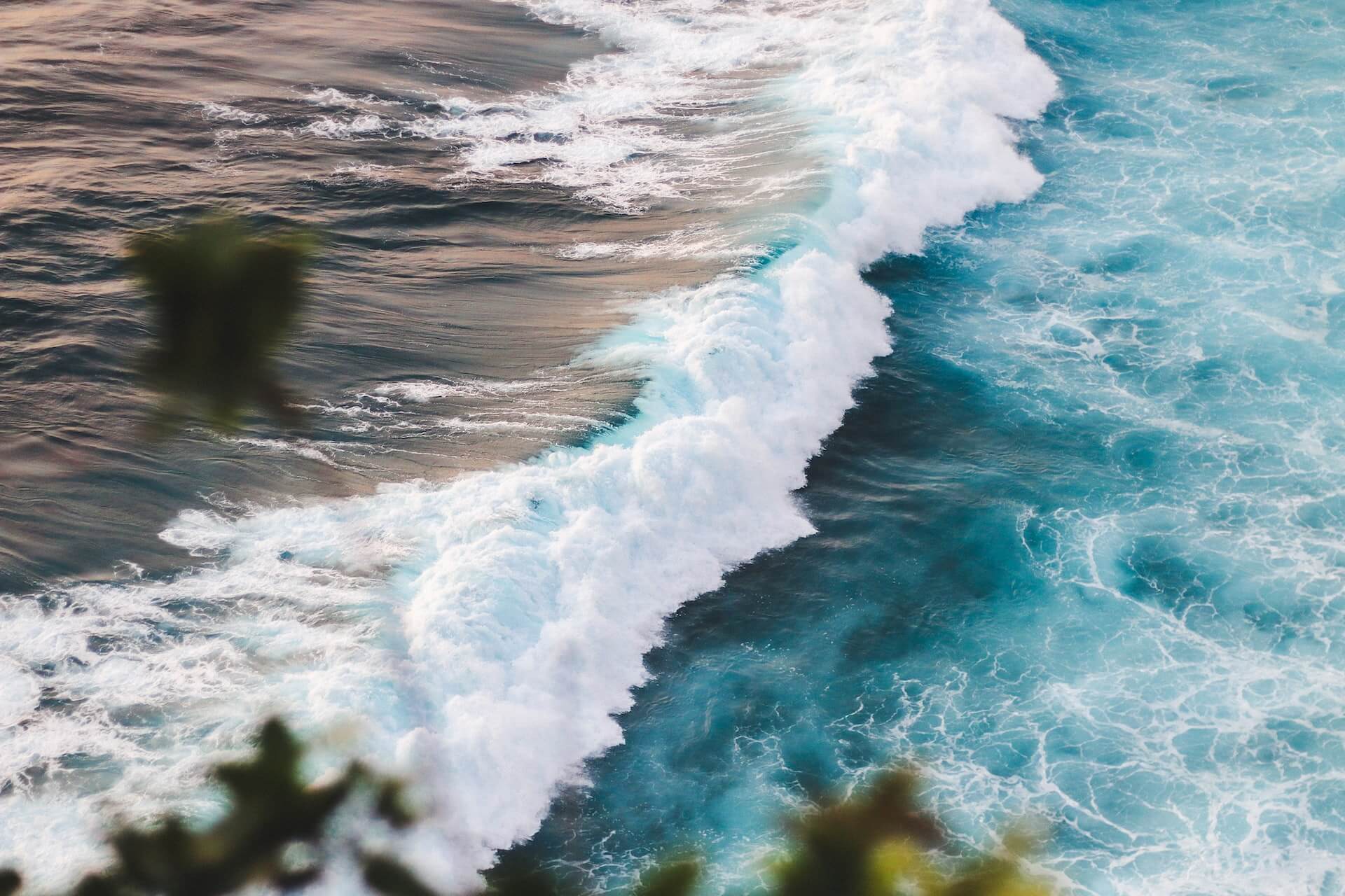 ocean waves and turquoise water in Bali